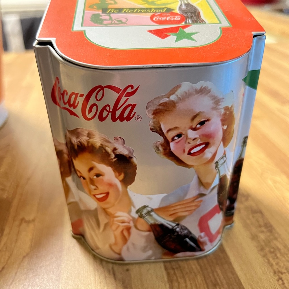 Vintage collectible Coca Cola tin with hinged lid